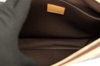 45. Louis Vuitton x Tyler the Creator Pochette Voyage Souple, Chocolate Craggy Monogram, Gold Hardware9