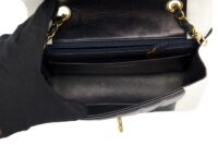 126. Chanel Black, White Vintage Mademoiselle Single Flap, Gold Hardware20